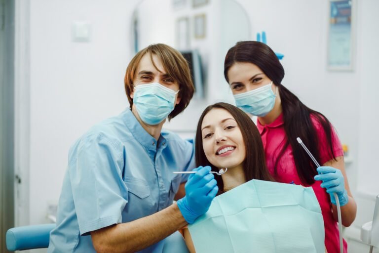 happy dentists with Dental Tourism patient