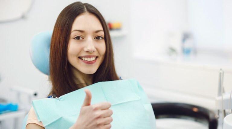 Positive girl smiling at City Dental Hospital, the best dentist near me, during a dental check-up.
